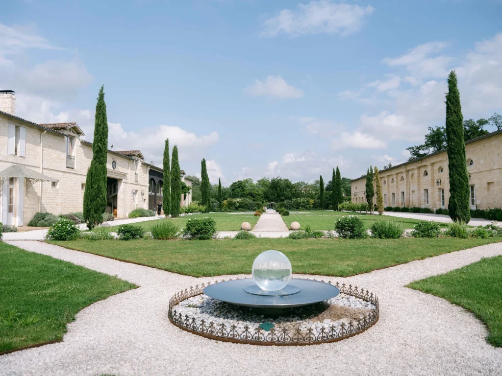 gassie-chateau-venue-french-gardens-cypress-fountain-elegant-estate.jpg